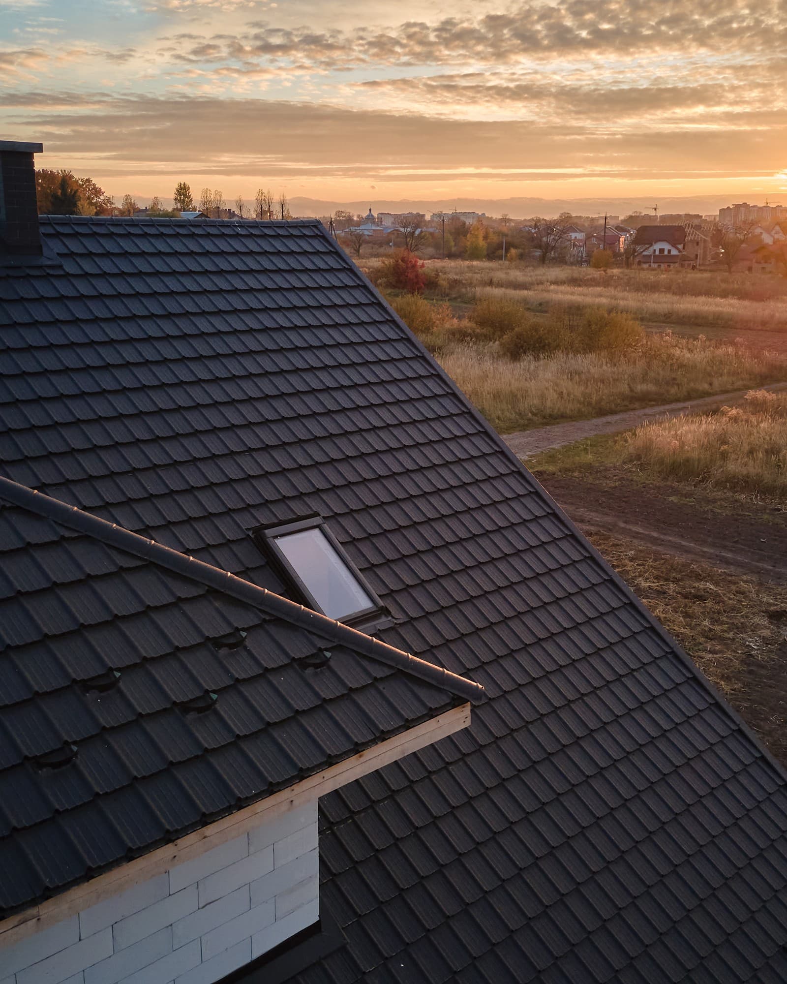 Metal tile roofing system — golden hour